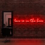 LOVE IS IN THE HAIR neon sign